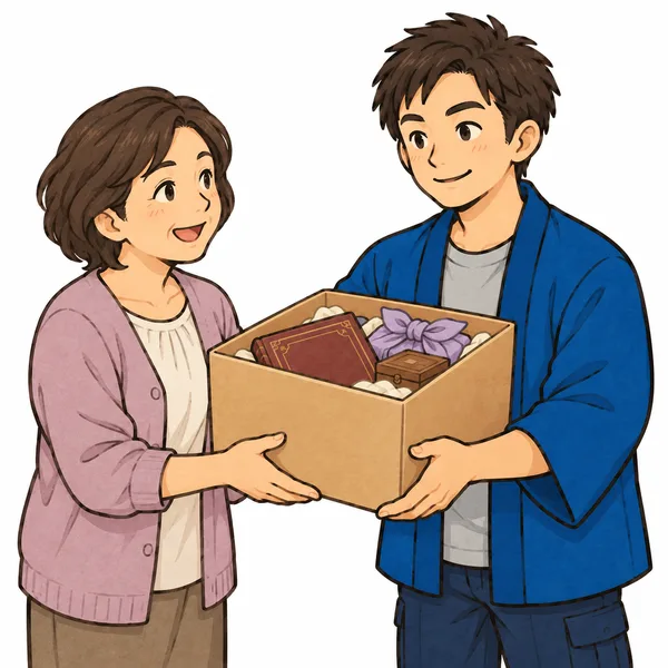 ご家族に箱を手渡すたくみさん